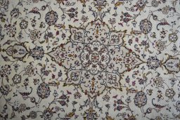Central medallion detail of 2000s Kashan rug from Iran / Persia