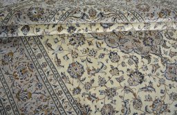 Close-up detail of 2000s Kashan rug from Iran / Persia showing Wool weave