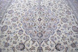 Central medallion detail of 2000s Kashan rug from Iran / Persia
