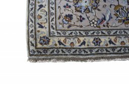 Close-up detail of 2000s Kashan rug from Iran / Persia showing Wool weave