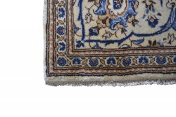 Central medallion detail of 2000s Kashan rug from Iran / Persia