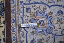 Full view of 2000s Kashan rug from Iran / Persia, 306 × 195 cm in Beige tones
