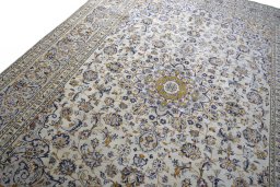 Backside of handmade 2000s Kashan rug showing knot structure and weave density