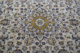 Central medallion detail of 2000s Kashan rug from Iran / Persia