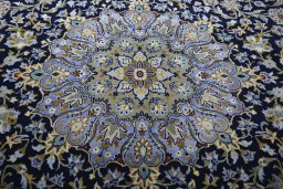Central medallion detail of 2000s Kashan rug from Iran / Persia