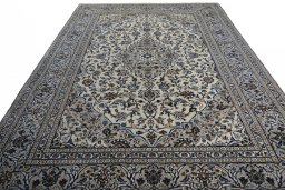 Surface texture of 2000s Kashan rug with natural Wool and intricate pattern