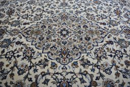 Central medallion detail of 2000s Kashan rug from Iran / Persia