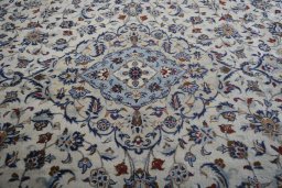 Central medallion detail of 2000s Kashan rug from Iran / Persia