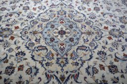Close-up detail of 2000s Kashan rug from Iran / Persia showing Wool weave