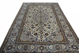 Surface texture of 2000s Kashan rug with natural Wool and intricate pattern