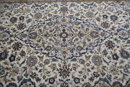 Central medallion detail of 2000s Kashan rug from Iran / Persia