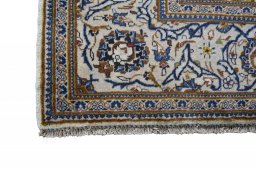 Close-up detail of 2000s Kashan rug from Iran / Persia showing Wool weave