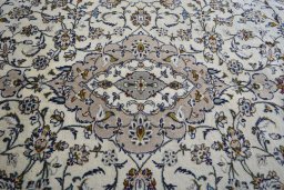 Central medallion detail of 2000s Kashan rug from Iran / Persia