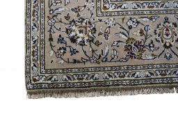 Close-up detail of 2000s Kashan rug from Iran / Persia showing Wool weave