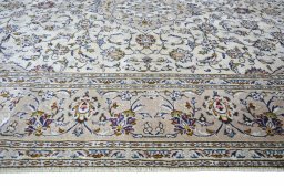 Full view of 2000s Kashan rug from Iran / Persia, 303 × 198 cm in Beige tones