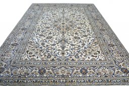 Surface texture of 2000s Kashan rug with natural Wool and intricate pattern
