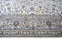 Full view of 2000s Kashan rug from Iran / Persia, 345 × 248 cm in Beige tones