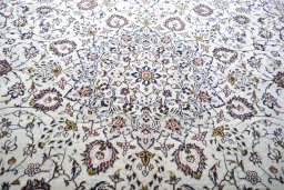 Central medallion detail of 2000s Kashan rug from Iran / Persia