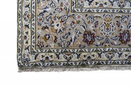Close-up detail of 2000s Kashan rug from Iran / Persia showing Wool weave