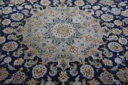 Central medallion detail of 2000s Kashan rug from Iran / Persia