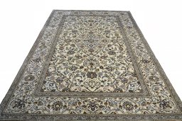 Surface texture of 2000s Kashan rug with natural Wool and intricate pattern