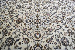 Central medallion detail of 2000s Kashan rug from Iran / Persia