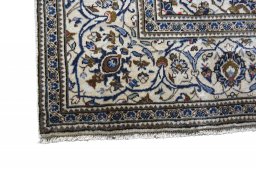 Close-up detail of 2000s Kashan rug from Iran / Persia showing Wool weave