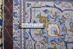 Surface texture of 2000s Kashan rug with natural Wool and intricate pattern
