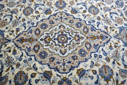 Central medallion detail of 2000s Kashan rug from Iran / Persia