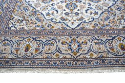 Close-up detail of 2000s Kashan rug from Iran / Persia showing Wool weave