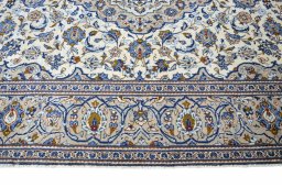 Full view of 2000s Kashan rug from Iran / Persia, 295 × 198 cm in Beige tones