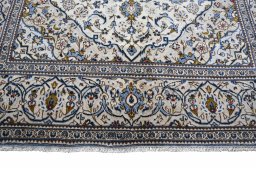 Close-up detail of 2000s Kashan rug from Iran / Persia showing Wool weave