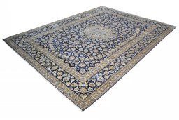 Corner detail of 2000s Kashan rug showing border pattern and Wool pile