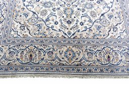 Close-up detail of 2000s Kashan rug from Iran / Persia showing Wool weave