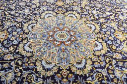 Central medallion detail of 2000s Kashan rug from Iran / Persia