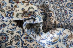 Close-up detail of 2000s Kashan rug from Iran / Persia showing Wool weave
