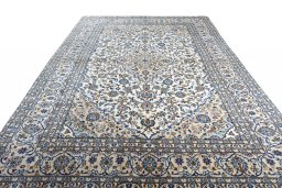 Surface texture of 2000s Kashan rug with natural Wool and intricate pattern