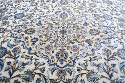 Central medallion detail of 2000s Kashan rug from Iran / Persia