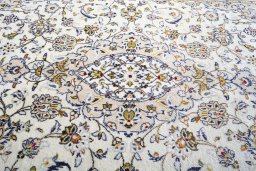 Central medallion detail of 2000s Kashan rug from Iran / Persia