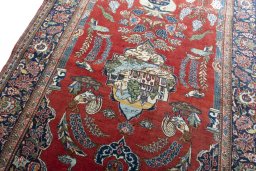 Backside of handmade 1930s Kashan rug showing knot structure and weave density