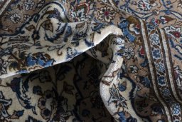 Close-up detail of 2000s Kashan rug from Iran / Persia showing Wool weave