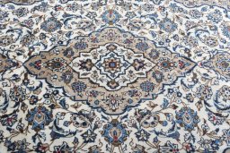 Central medallion detail of 2000s Kashan rug from Iran / Persia