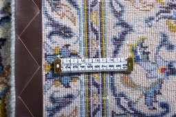 Surface texture of 2000s Kashan rug with natural Wool and intricate pattern