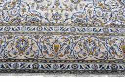 Close-up detail of 2000s Kashan rug from Iran / Persia showing Wool weave