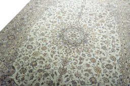 Backside of handmade 2000s Kashan rug showing knot structure and weave density