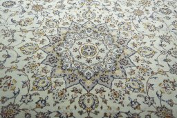 Central medallion detail of 2000s Kashan rug from Iran / Persia
