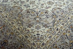 Close-up detail of 2000s Kashan rug from Iran / Persia showing Wool weave