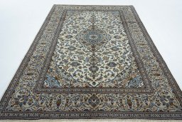 Surface texture of 2000s Kashan rug with natural Wool and intricate pattern