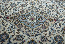 Central medallion detail of 2000s Kashan rug from Iran / Persia