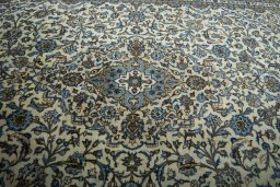 Central medallion detail of 2000s Kashan rug from Iran / Persia